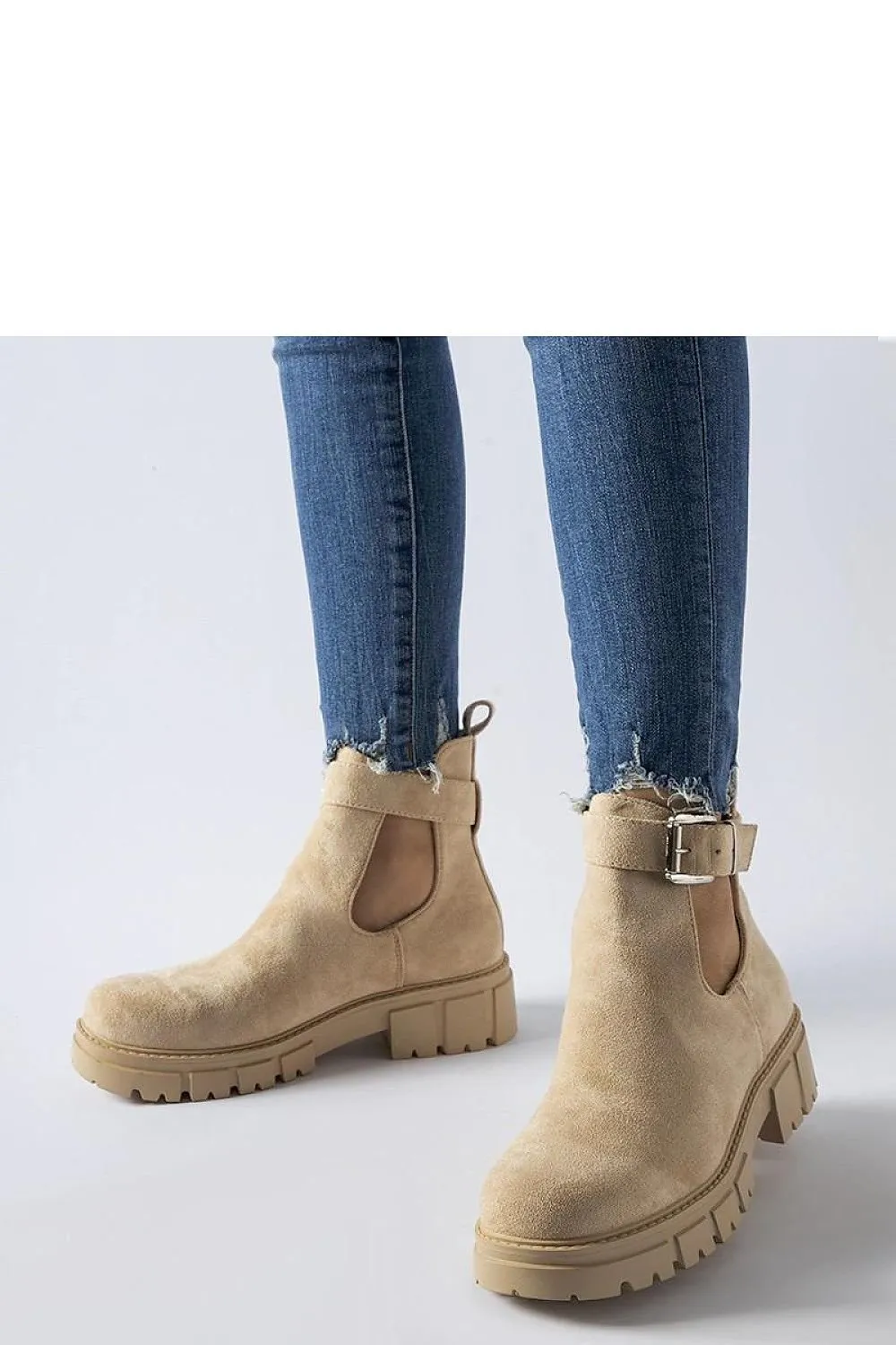Beige ankle boots with decorative fastening